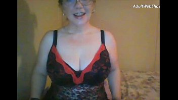 Smiling, mature and busty - AdultWebShows.com